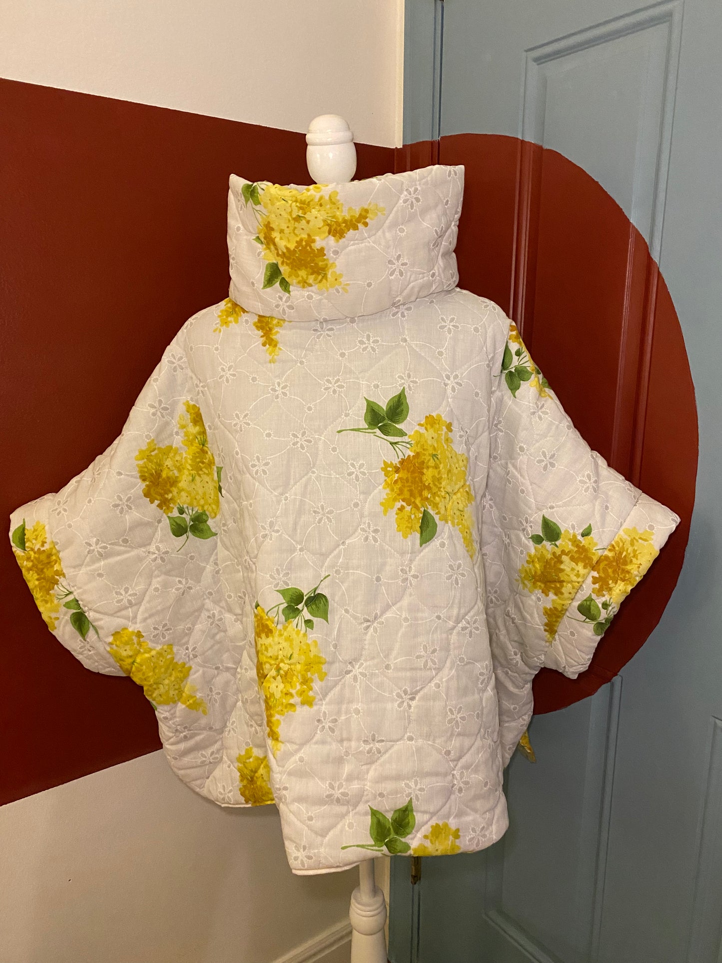 Yellow floral comforter poncho